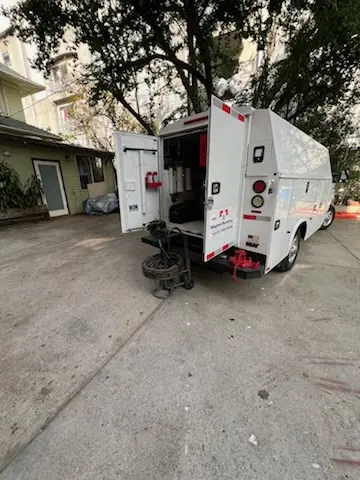 Magnet Plumbing service vehicle on-site for Grease Trap Cleaning in Cypress Lake